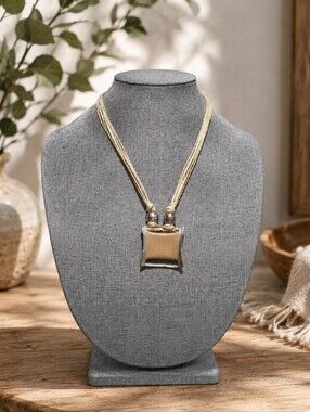 Elegant Gold and Silver Pendant Necklace